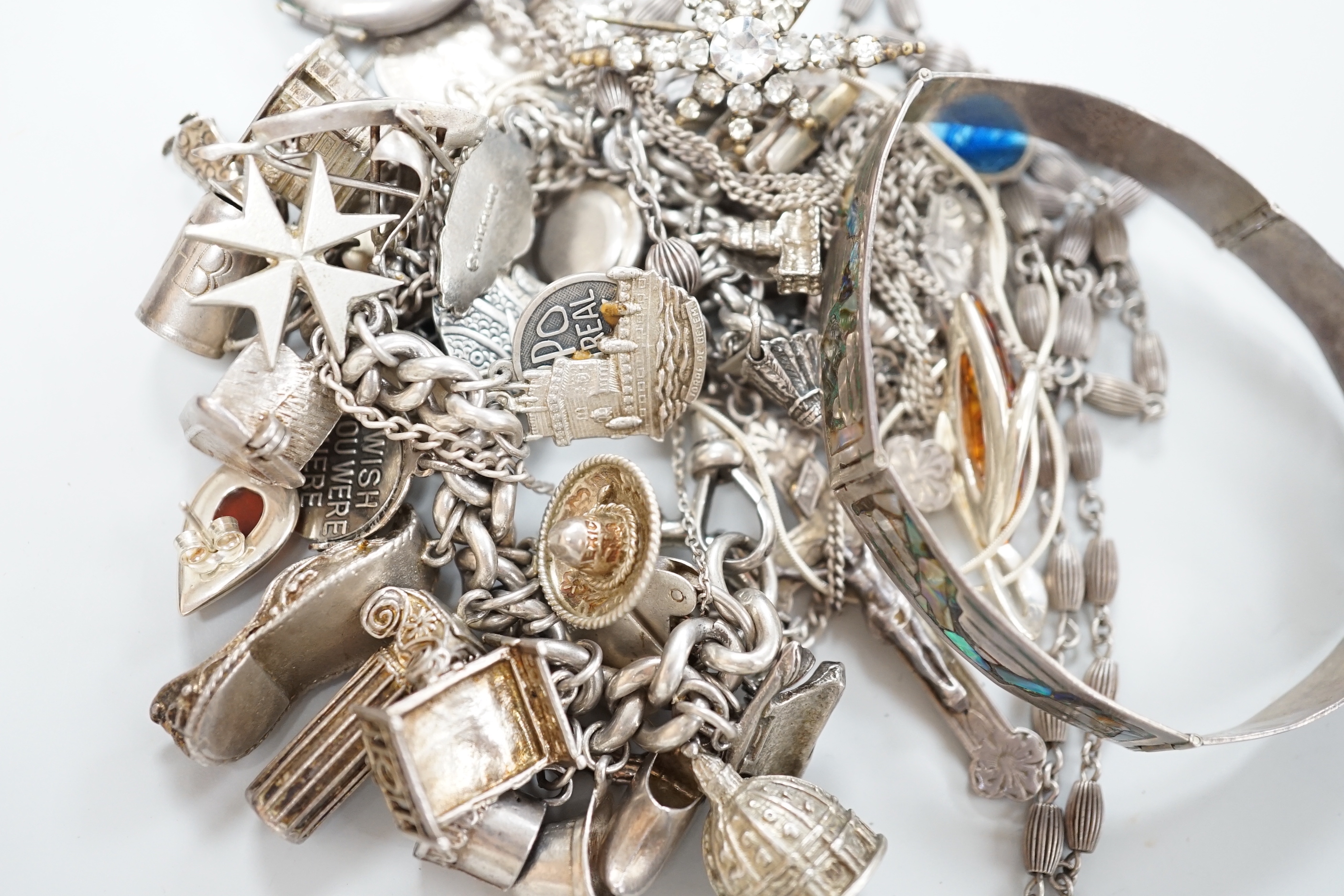 A silver charm bracelet and a small quantity of other silver and white metal jewellery.
